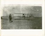Edward Korn Standing Near a Farman Biplane, circa 1911