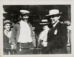 Edward Korn Standing with a Crowd of People, circa 1912