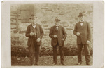Three Men Posing for Group Photograph