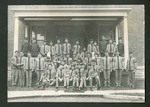 Photo of Miami Military Institute cadets and faculty posed on the porch of the president's home, 1903