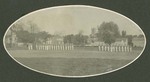 Photograph of Miami Military Institute cadets in dress uniform performing military drills on a field, 1904