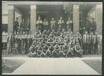 Photograph of cadets and faculty posed on steps and entrance to Miami Military Institute, 1905