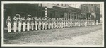 Photograph of Miami Military Institute cadets in dress uniform forming a line on Third Street in Cincinnati, Ohio, 1905