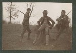 Photograph of three unidentified Miami Military Institute cadets at play, 1904