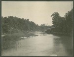 Photo of men by a creek, 1904