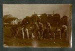 Photograph depicting young men from Miami Military Institute in football garb in formation on a playing field, 1904