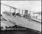 Howard Rinehart piloting a De Havilland DH-4 with a camera mounted on the Scarff ring at the Dayton-Wright Airplane Company South Field May 14, 1918 by The Dayton-Wright Airplane Company