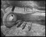 Mark V release mechanism and Mark III high explosive bombs on a De Havilland DH-4 at the Dayton-Wright Airplane Company South Field April 15, 1918 by The Dayton-Wright Airplane Company
