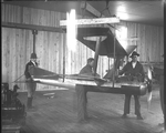 Dayton-Wright Airplane Company employees work on the Kettering Bug by The Dayton-Wright Airplane Company