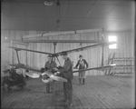Employees of the Dayton-Wright Airplane Company working on the Kettering Bug by The Dayton-Wright Airplane Company