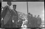 Orville, Wilbur, and Bishop Milton Wright on stage during the 1909 Wright Brothers Homecoming Celebration medals ceremony by Andrew S. Iddings