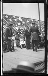 James Allen, Chief Signal Officer, United States Army, presenting the congressional medals to Wilbur and Orville Wright at the 1909 Wright Brothers Homecoming Celebration medals ceremony by Andrew S. Iddings