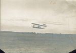 Right front view of Wilbur Wright in flight at Camp d'Auvours