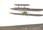 Wilbur Wright with passenger flying a Wright 1907 Flyer at Le Mans, 1908