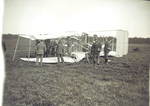 Examining damage after Wilbur Wright's accident by Illustrations Bureau, London