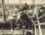 King Alfonso XIII climbing into the Wright Model A Flyer