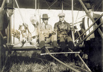 King Alfonso XIII and Wilbur Wright seated in the Wright Model A Flyer by M. Rol and Company, Paris
