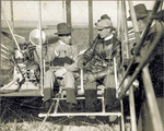 Alfonso XIII and Wilbur Wright seated in the Wright Model A Flyer