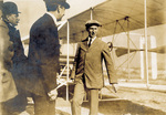 Wilbur Wright in front of the Flyer