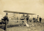 Orville Wright seated in the Baby Grand