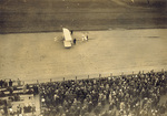 Grandstand view of Wright Model B Flyer on racetrack by Edwin Levick