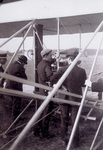 Orville Wright and spectators with the Flyer