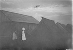 Women watch the Signal Corps Flyer