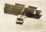 Delagrange's Voisin biplane in flight by J. Theodoresco