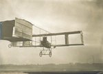 Delagrange's Voisin biplane in flight by J. Theodoresco