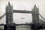 Frank K. McClean flies through Tower Bridge