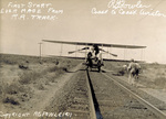 Robert G. Fowler prepares to take-off from railroad tracks by Robert G. Fowler