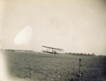 Wright Model A Flyer in flight over Huffman Prairie