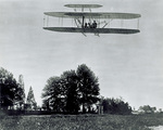 Front view of Wright Model A Flyer in flight