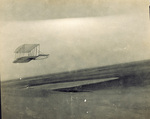 Wilbur Wright gliding in Wright 1901 glider
