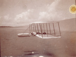 Wilbur Wright lands the Wright 1901 Glider by Wright Brothers