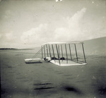 Wilbur Wright lands the Wright 1901 Glider by Wright Brothers