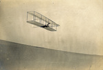Wilbur Wright piloting the Wright 1902 glider by Lorin Wright