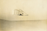 Wilbur Wright piloting the Wright 1902 glider by Lorin Wright