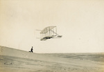 Wilbur Wright gliding in Wright 1902 glider