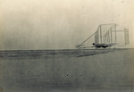 Wilbur Wright gliding in the Wright 1902 glider by Wright Brothers