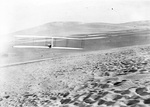 Wright 1902 glider in flight by Wright Brothers