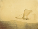 Side view of Wright 1902 glider in flight