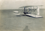Wilbur Wright and 1903 Flyer after false start