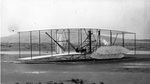 Damaged Wright 1903 Flyer after fourth flight by Wright Brothers