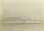 Rear view of Wright 1903 Flyer on launch rail by Wright Brothers