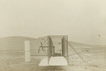 Right profile view of the Flyer ready for flight testing by Wright Brothers