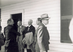 Orville Wright shaking hands with James "Jimmy" Doolittle