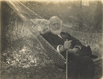 Bishop Milton Wright sitting in a hammock