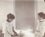 Katharine Wright and Harriet Silliman washing dishes