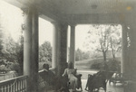 Orville and Katharine Wright sitting on porch of Hawthorn Hill home